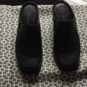 Black slip on leather upper heeled shoes